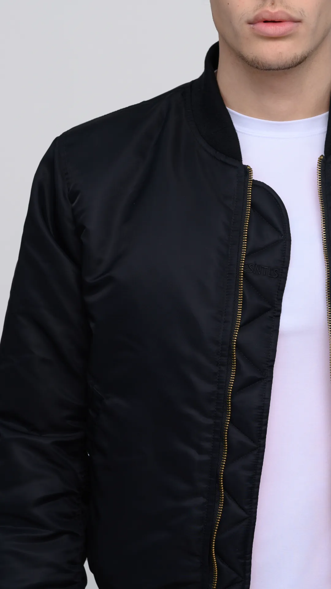 The ESNTLS Black Bomber Jacket