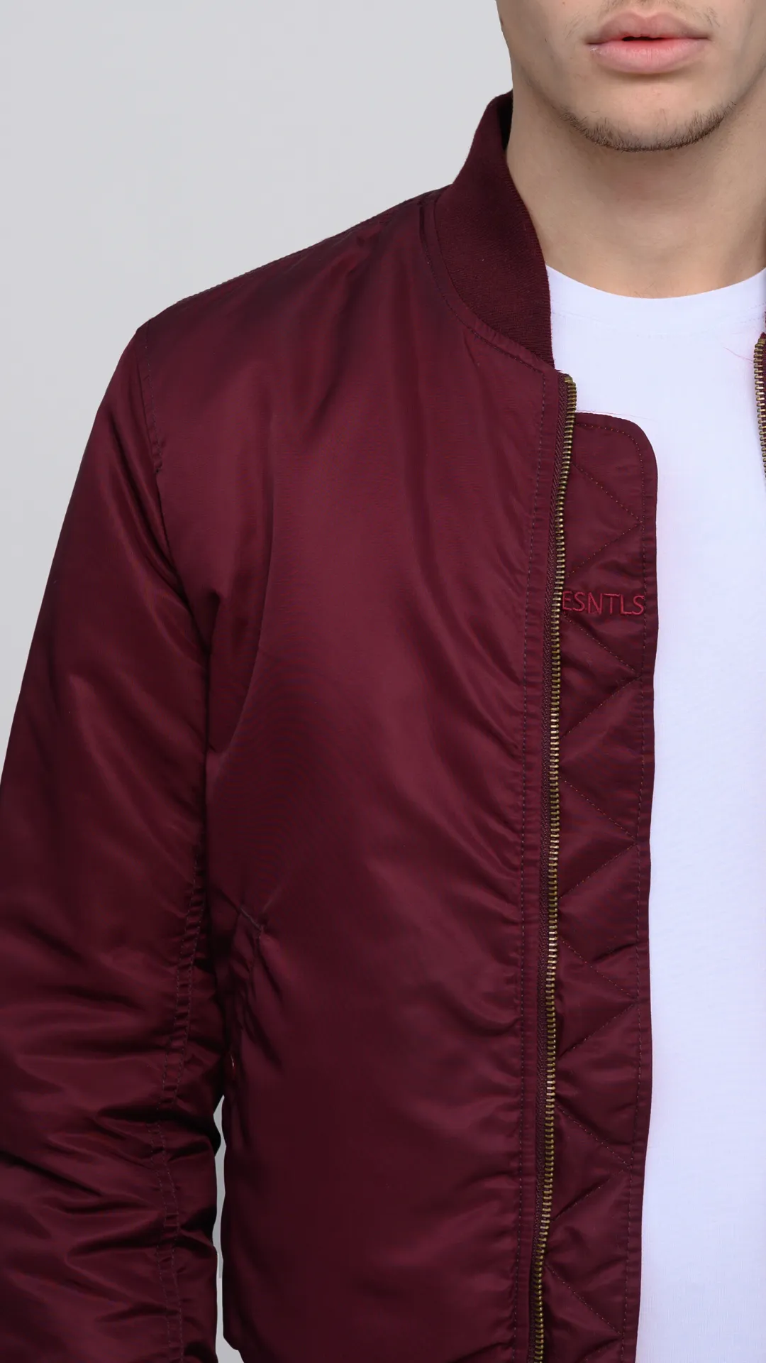 The ESNTLS Burgundy Bomber Jacket